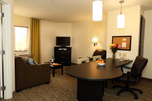 Cozy modern style Candlewood Suites hotel room with free wifi and spa services